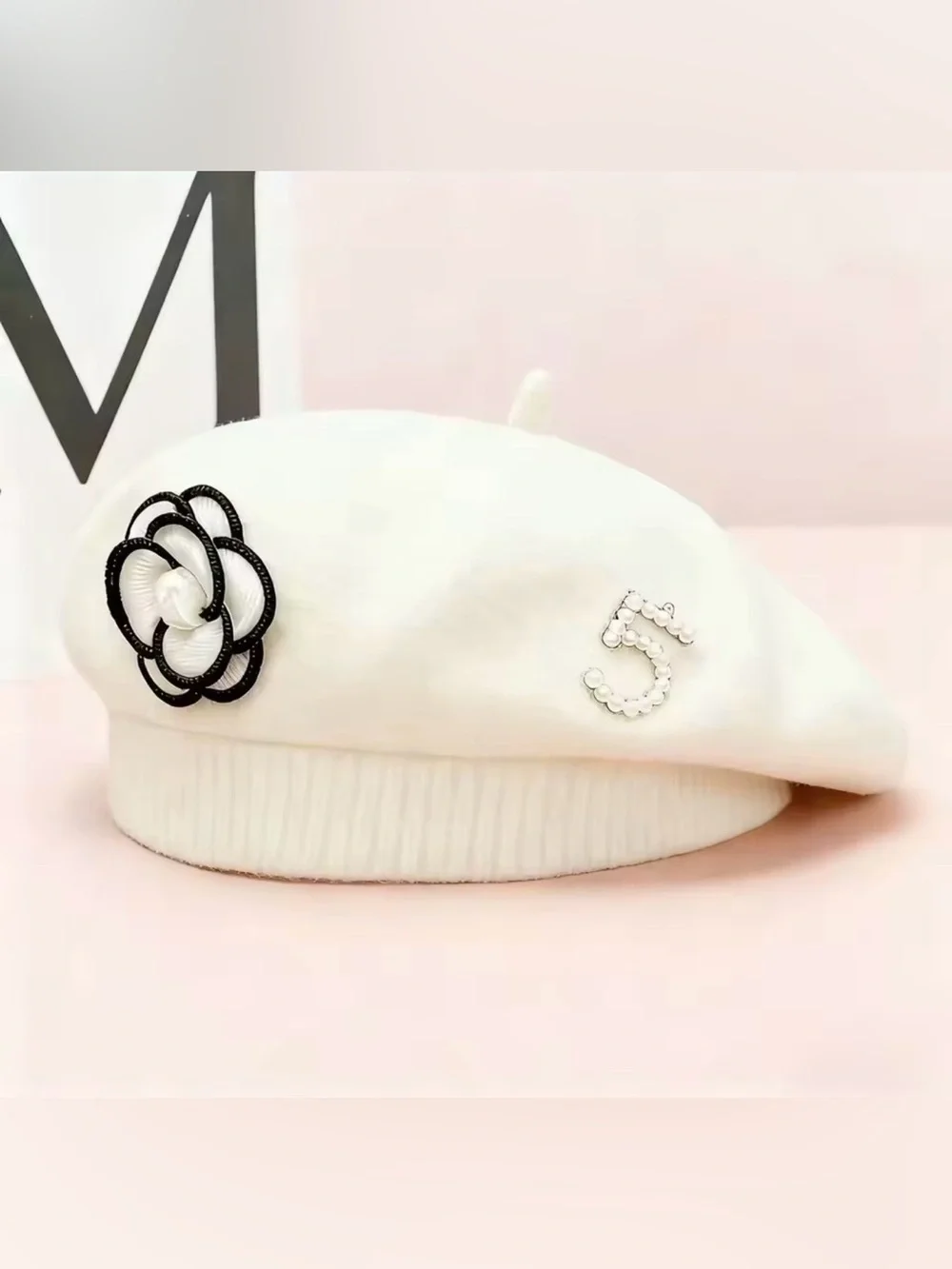 Elegant White Beret with Pearl '5' Accent and Black Flower Detail
